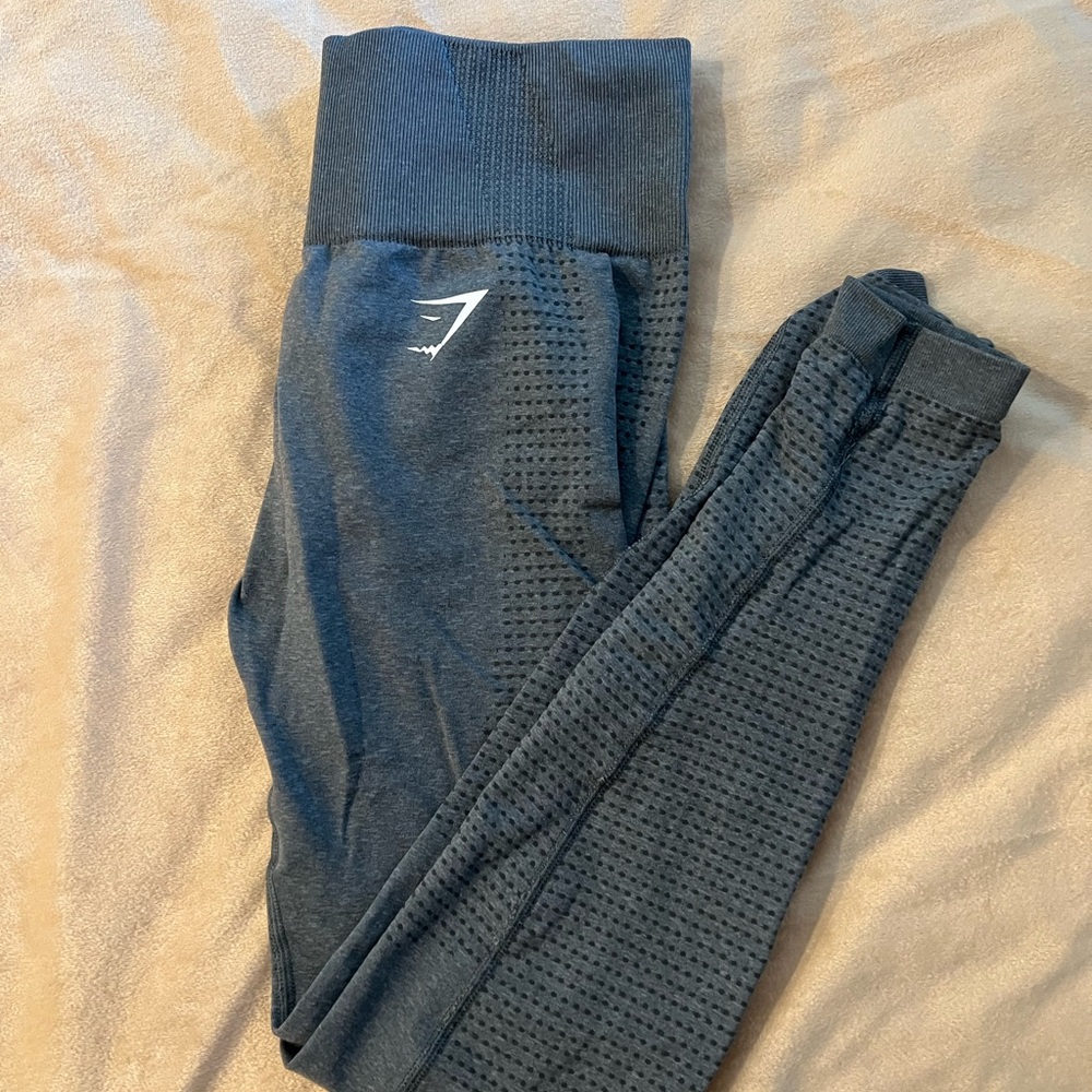 - Gymshark Gray Performance Leggings with High Waist and Mesh Panels